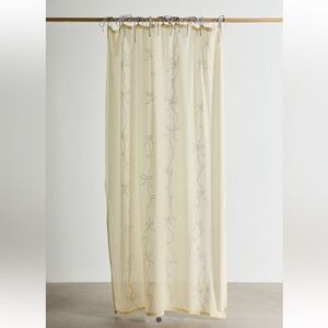 Elegant Cream Sheer Curtain with Bow Design